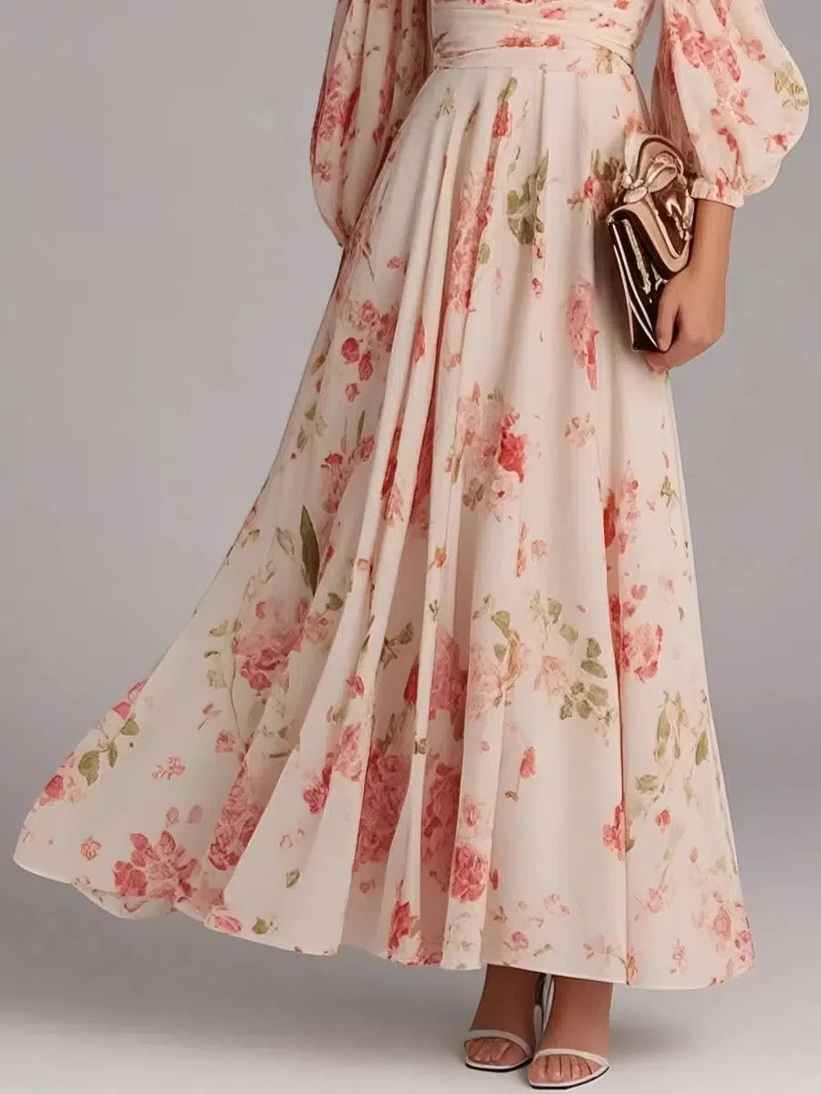 Robe longue rose à imprimé floral et col en V