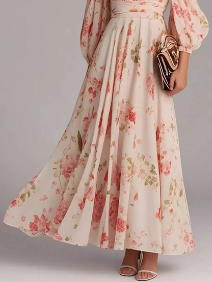 Robe longue rose à imprimé floral et col en V