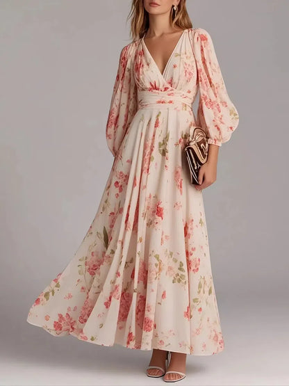Robe longue rose à imprimé floral et col en V