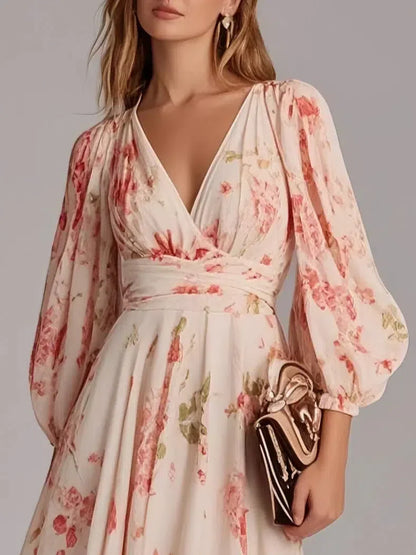 Robe longue rose à imprimé floral et col en V